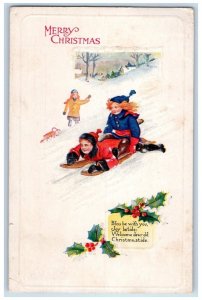 c1910's Christmas Girls Sledding Winter Snow Holly Berries Embossed Postcard