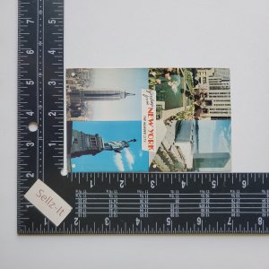 NY Greetings Rockefeller Center UN Empire State Statue of Liberty Postcard