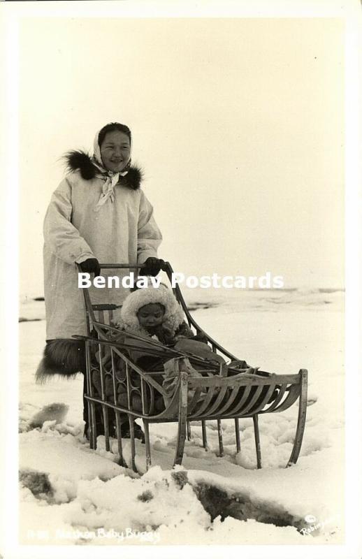 Alaska, Native Eskimo Woman with Baby Buggy, Sledge (1950s) RPPC