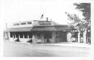 J65/ Hoxeyville Michigan RPPC Postcard c50s Store Gas Station Post Office 422