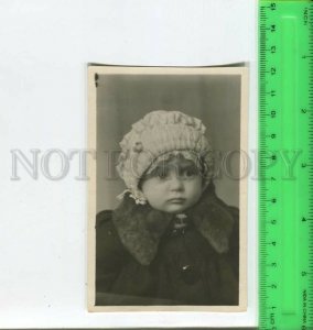 452081 USSR 1945 year girl in coat and bonnet with donation Old photo