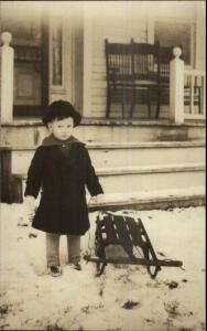 Little Boy & His Sled House Porch c1910 Real Photo Postcard