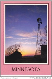 Windmill ans Sunset On A Minnesota Prairie Farm