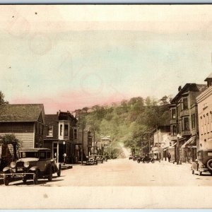 NICE c1930s Hand Colored Downtown RPPC Real Photo Unknown Town Ford A Cars A72