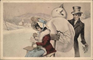 Victorian Man Sneaks Up on Woman with Mistletoe Snowman c1910 Postcard