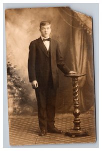 Vintage 1910's RPPC Postcard - Studio Portrait Dapper Victorian Man With Bowtie