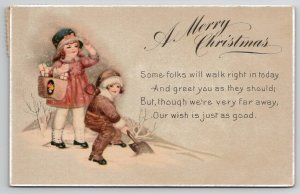 Christmas Greetings Darling Children Bag of Presents Shoveling Snow Postcard Z25