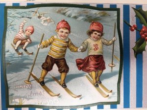 Children Skiing Loving Christmas Wishes Postcard Embossed