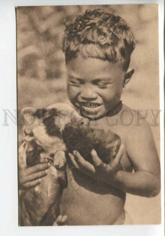 438928 FRENCH Oceania catholic mission Semi-nude boy with a little pig postcard