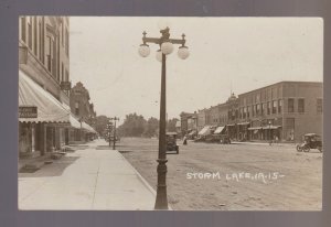 Storm Lake IOWA RPPC 1914 MAIN STREET STORES nr Cherokee Alta Newell Schaller IA