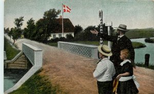 Postcard People look across Bridge Flag of Denmark Paul Steffensen Ved Kongeaaen