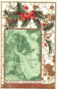 Vintage Postcard 1909 A Merry Christmas Beautiful Angel Swinging Holly Greetings