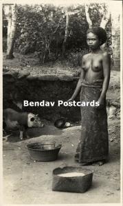 indonesia, BALI, Native Nude Balinese Woman feeding Pig (1920s) RPPC