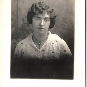 c1910s Lovely Stoic Young Lady RPPC Dark Tan Bushy Eyebrows Real Photo Girl A159