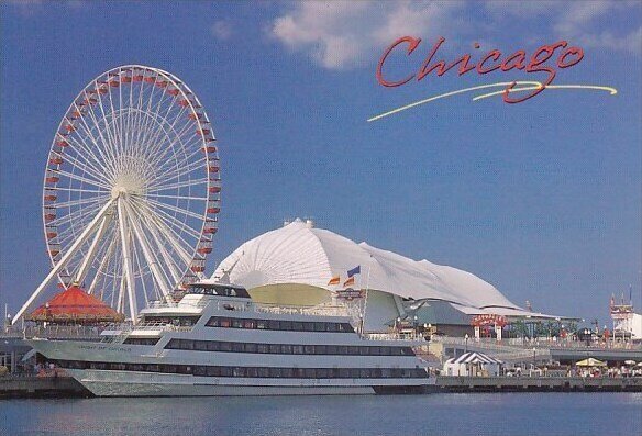 A Ferry Boat At Navy Pier With A Ferris Wheel In The Background Chicago Illinois