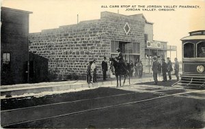 c1910 Postcard All Trolley Cars Stop at Jordan Valley OR Pharmacy Malheur County