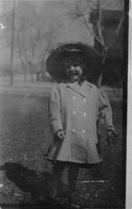 1910s RPPC Real Photo Postcard Young Girl Coat and Big Hat Outside