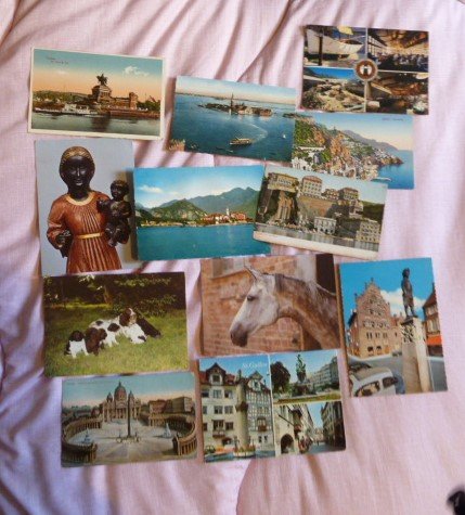 World Selection of  350 assorted used and new postcards,