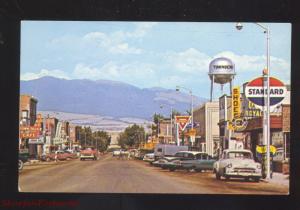 TOWNSEND MONTANA DOWNTOWN STREET SCENE 1950's CARS WATER TOWER OLD POSTCARD