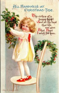 Postcard Clapsaddle All Happiness at Christmas Tide Girl on a Chair1914 A13