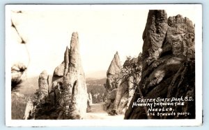 RPPC CUSTER STATE PARK, SD ~ Highway Through the NEEDLES  c1930s   Postcard