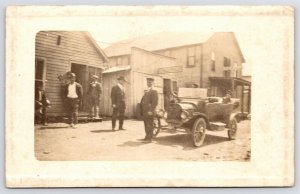 RPPC Automobile Driver & Military Leader?~Men by Parlor on Main St~Casinos? 1910