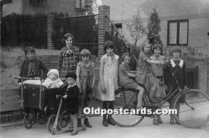 Group of people with bicycle Real Photo Bicycle Writing on back 