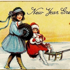 1900s New Year's Greeting Postcard Embossed Sledding Toboggan DWN10A