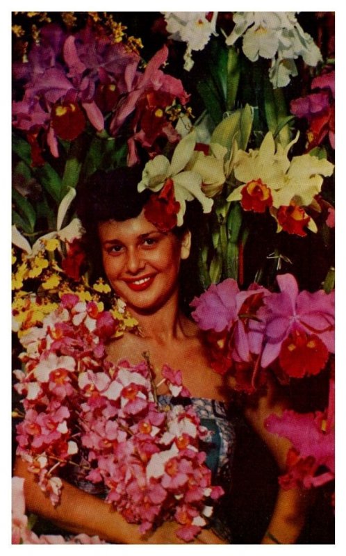 Island Beauty surrounded by orchids Hawaii Postcard
