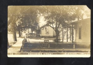 RPPC HASTINGS IOWA RESIDENCE STREET SCENE VINTAGE REAL PHOTO POSTCARD 1911