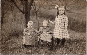 Darling Children Plaid Dresses Rocking Chair Rustic Scenery Postcard G26