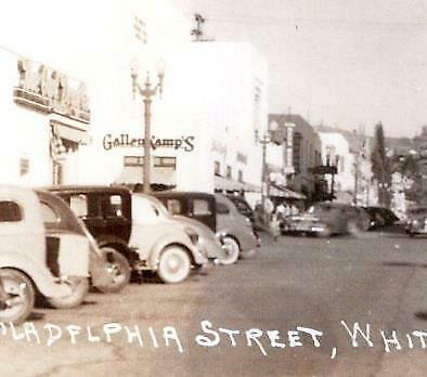 RPPC WHITTIER CALIFORNIA*CA*PHILADELPHIA STREET*GALLENKAMPS STORE*OLD CARS