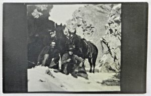 1920's Two Men Taking Rest with Horses in Rough Terrain - Vintage Postcard