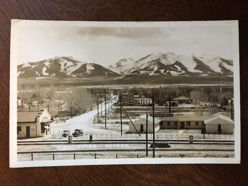 RPPC 1950s’ Winnemucca, Nevada, Western Inn at Train Tracks, Winter Z3