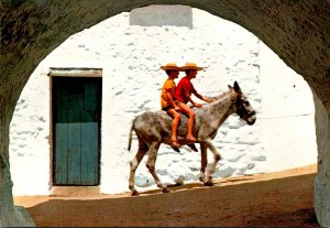 Spain Costa De Sol Mijas Typical Scene Boys Riding Donkey