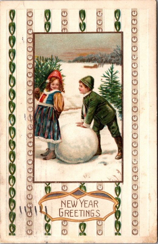 New Year Postcard Boy and Girl Making a Snowman Rolling Snow Into Ball