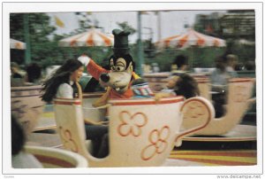 Goofy goes for a spin, Fantasyland's Mad Tea Party, WaltDisneyWorld, 40-60s