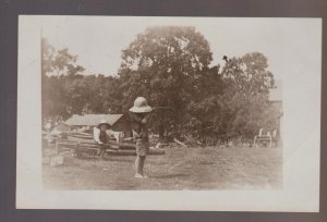 Manly IOWA RPPC c1910 BOY holding TOY Little Brother FARM Tool INSTRUMENT? IA