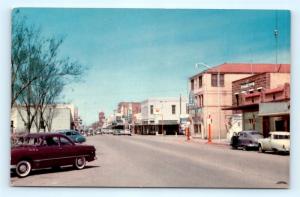 Postcard AZ Winslow Route 66 Through Winslow Street View c1950s Downtown D23