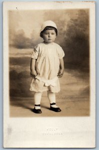 Little Girl With Bonnet Studio Kelly Oskaloosa Leighton IA RPPC Photo Postcard