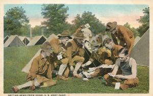 US ARMY CAMP GETTING NEWS FROM HOME ANTIQUE WWI MILITARY ANTIQUE POSTCARD