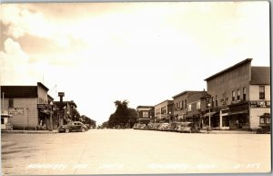 RPPC Newberry Avenue South, Business District Newberry MI Vintage Postcard S29