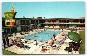 1970s EAST PEORIA ILLINOIS  HOLIDAY INN  I74 SWIMMING POOL SUNBATHERS  P2381