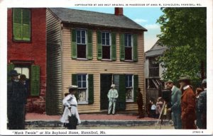 Postcard MO Hannibal - Mark Twain at his boyhood home - standing outside door