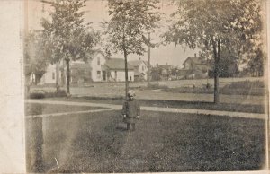 LANSING MICHIGAN-CHILD IN FRONT OF FARM HOUSE~1900s BOVEE REAL PHOTO POSTCARD