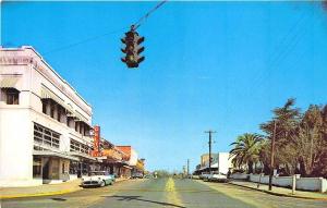 Bonify FL Wauksha Street Delt's 5 & !0 cent Store Old Cars Postcard