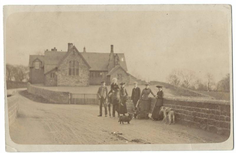 Family Group in Front of Unidentified Schoolhouse RP PPC, Unposted