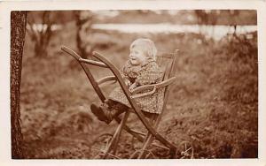 Child in a chair Child, People Photo Unused 