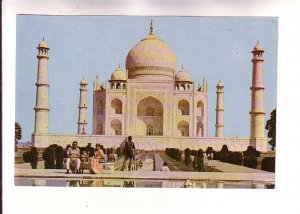 Indian Family on Bench in Front of Taj Mahal, Agra, India