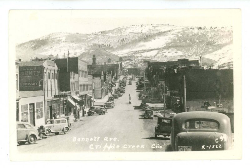 CO - Cripple Creek. Bennett Ave Street Scene, Shell Gas Station ca 1938 RPPC